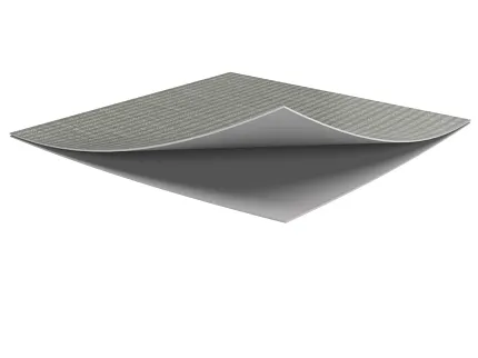 Muestra de alfombra comercial gris claro. Muestra de alfombra comercial en color gris claro con superficie texturizada.