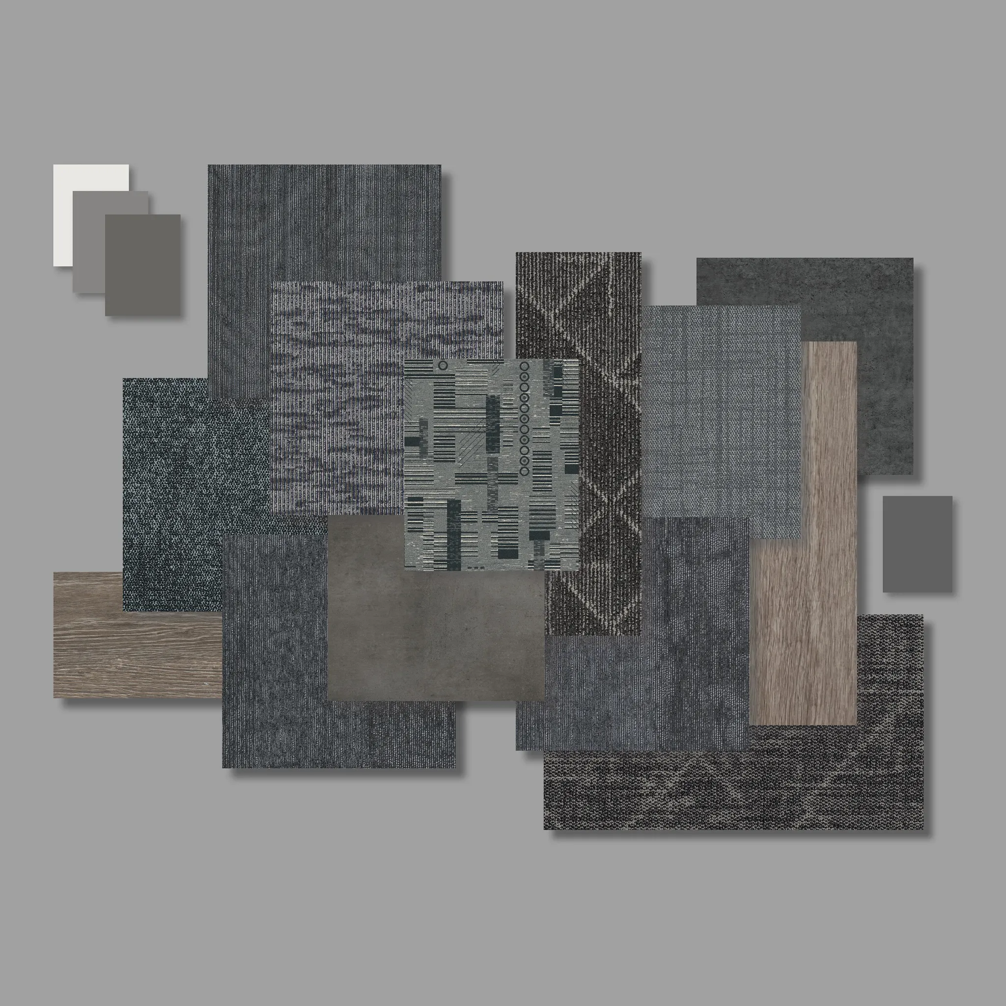 Assorted commercial carpet tile samples in shades of gray and blue