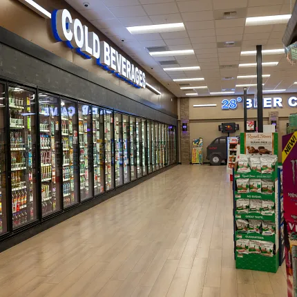 Durable Rigid Mineral Core flooring with 47.55x5.66 inch dimensions Rigid Core flooring in a grocery store aisle