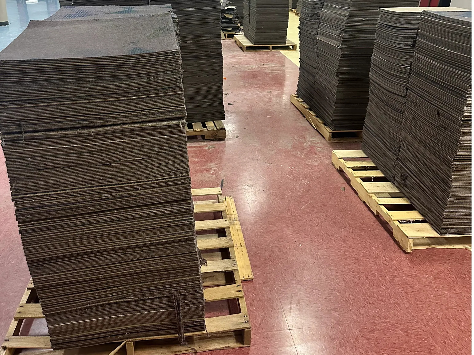 existing ecoworx carpet tile stacked on pallets