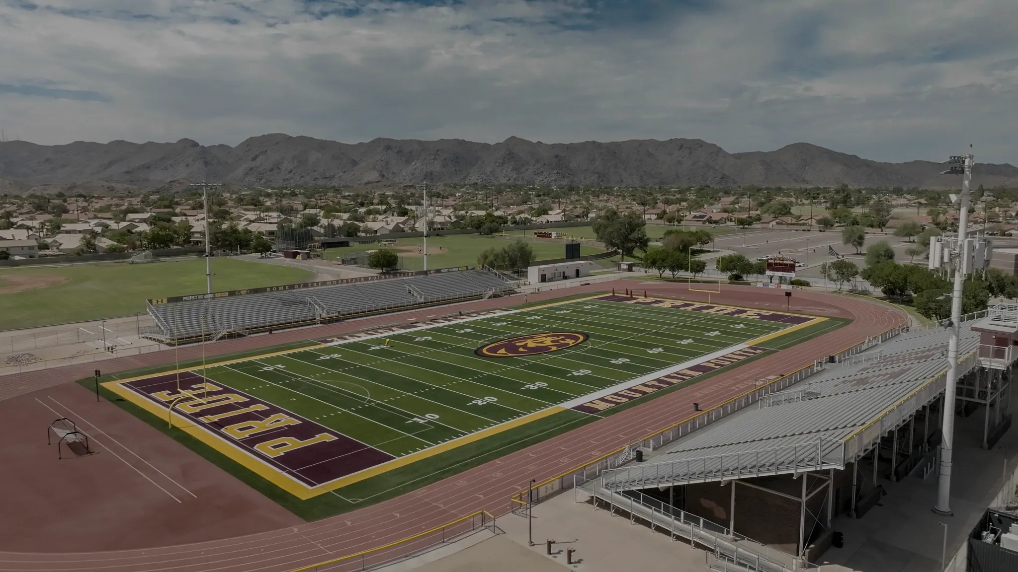 Aerial view of a sports stadium with track and field