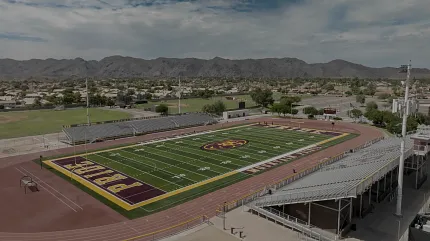 Expansive sports stadium with track and field facilities Aerial view of a sports stadium with track and field