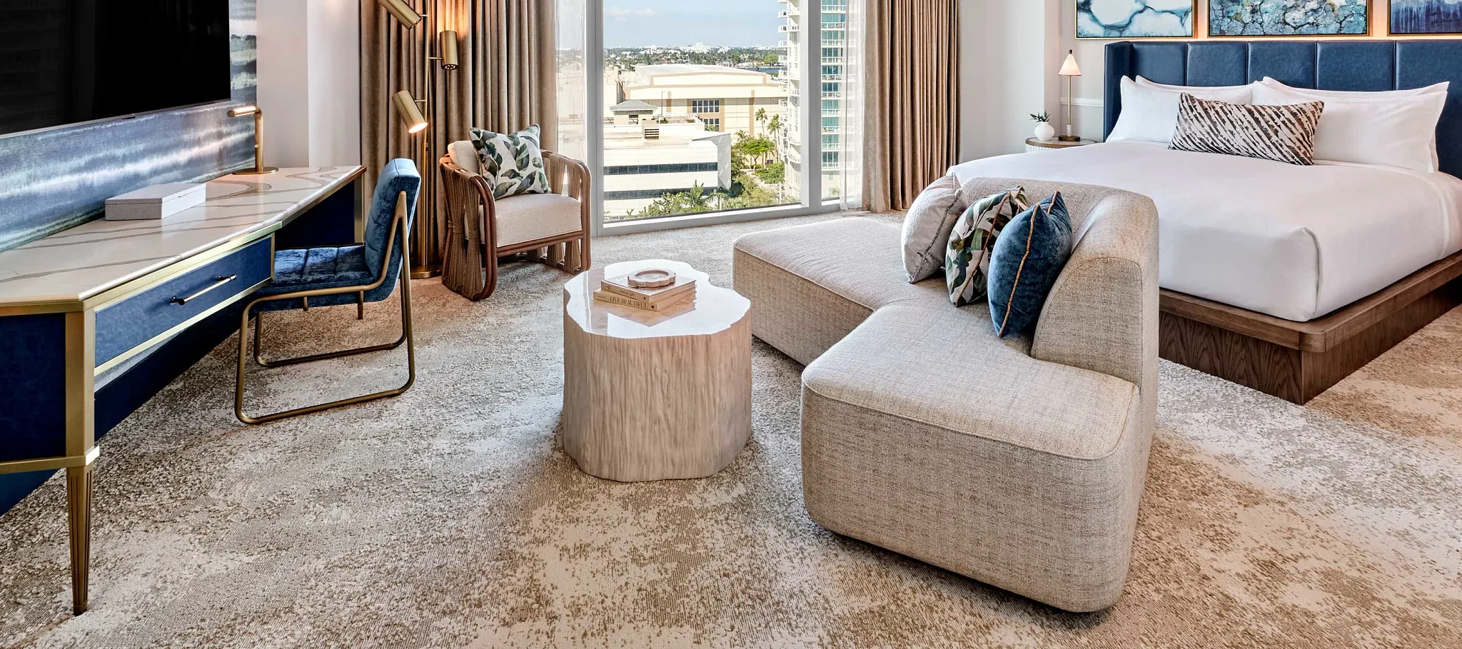 Modern hotel room with plush carpet flooring