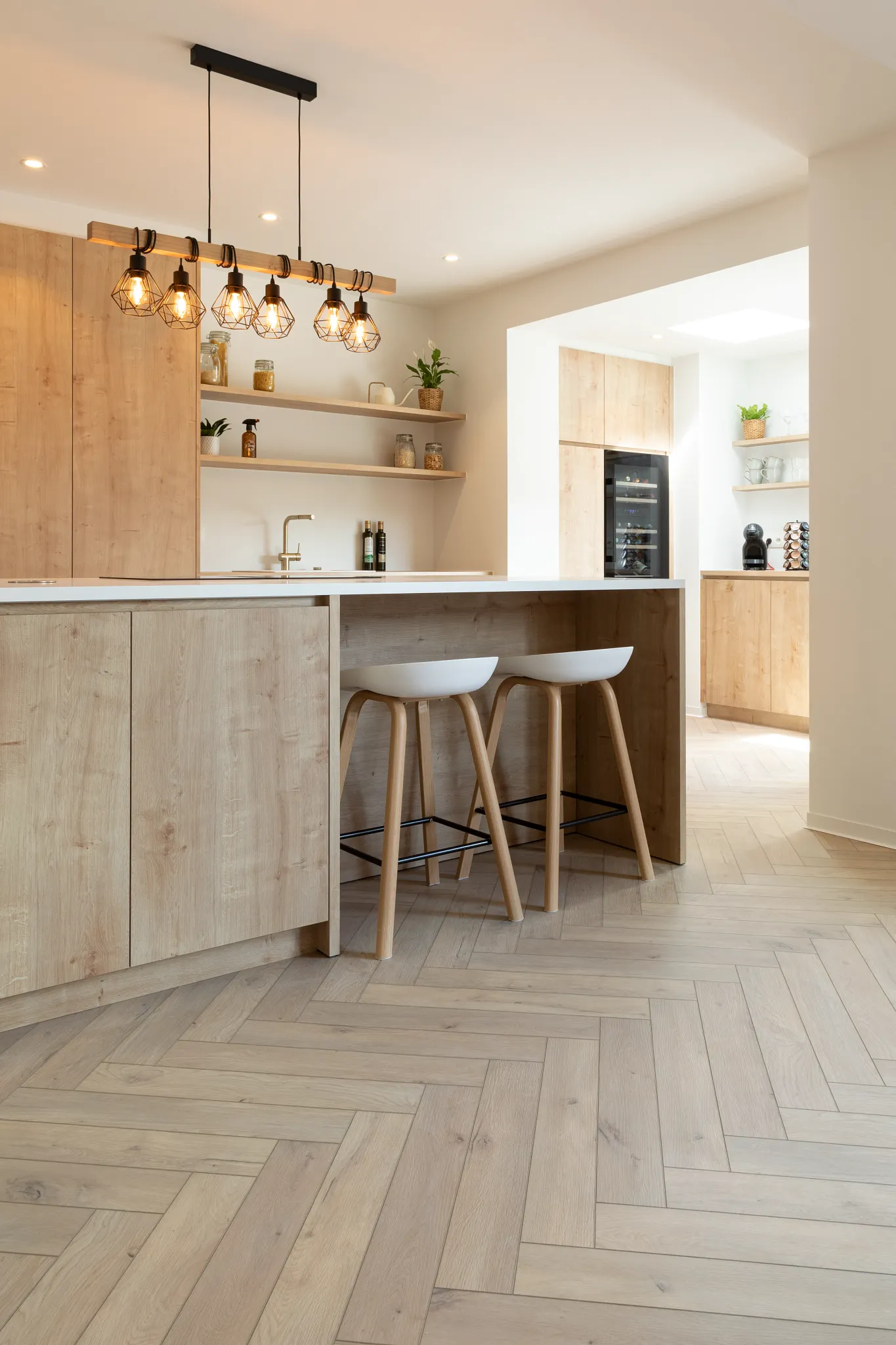 Country kitchen with wooden herringbone flooring from Coretec 