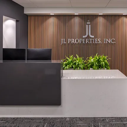 Contemporary Workplace Reception with Commercial Carpet Tile Flooring Modern office reception area with sleek black and white desk, wooden slat wall, and commercial carpet tile flooring