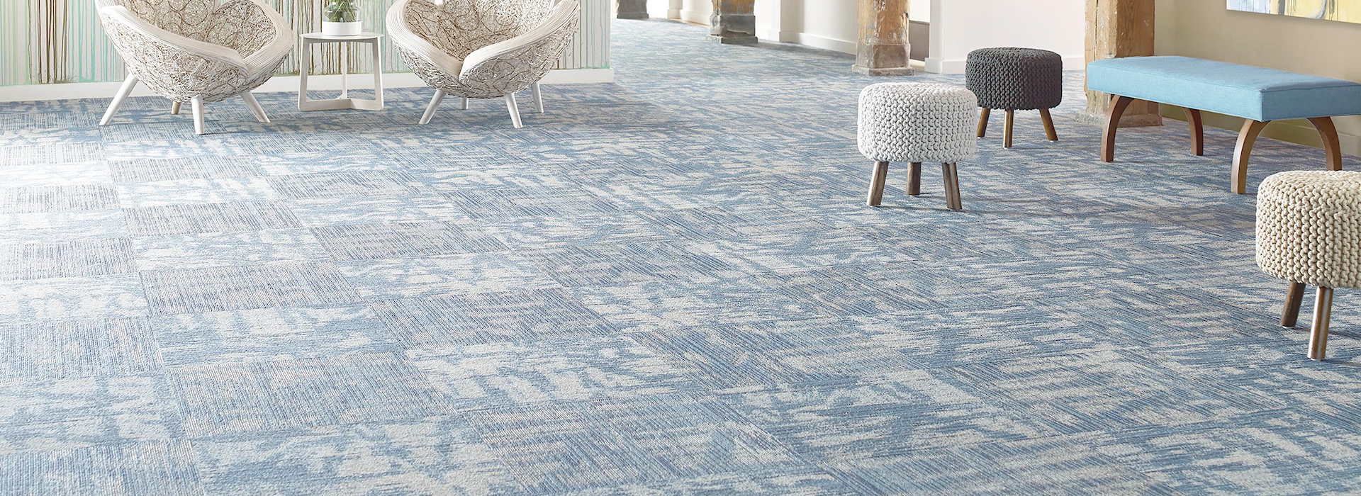 Bright blue, patterned carpet tile with beautiful furniture