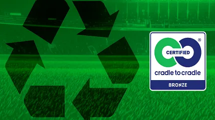 Cradle to Cradle Bronze Certified Artificial Turf Image Cradle to Cradle Bronze certified artificial turf with recycling symbol overlay