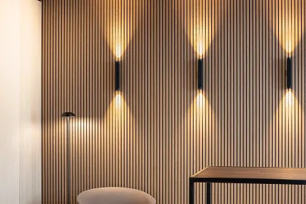 Contemporary wood-look vinyl flooring for elegant interiors Modern lounge area with wood-look vinyl flooring and stylish seating