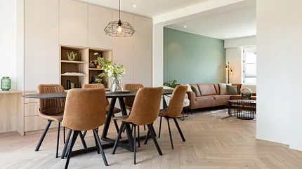 Contemporary dining room featuring wood look luxury vinyl flooring Modern dining room with brown chairs and wood look luxury vinyl flooring
