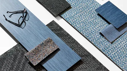 Blue and Gray Flooring Swatches with Office Supplies and Basketball Assorted flooring swatches in shades of blue and gray with office supplies and a basketball
