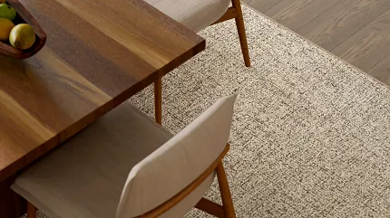 Elegant dining room featuring 100% wool carpet flooring Modern dining room with wooden table and chairs on 100% wool carpet