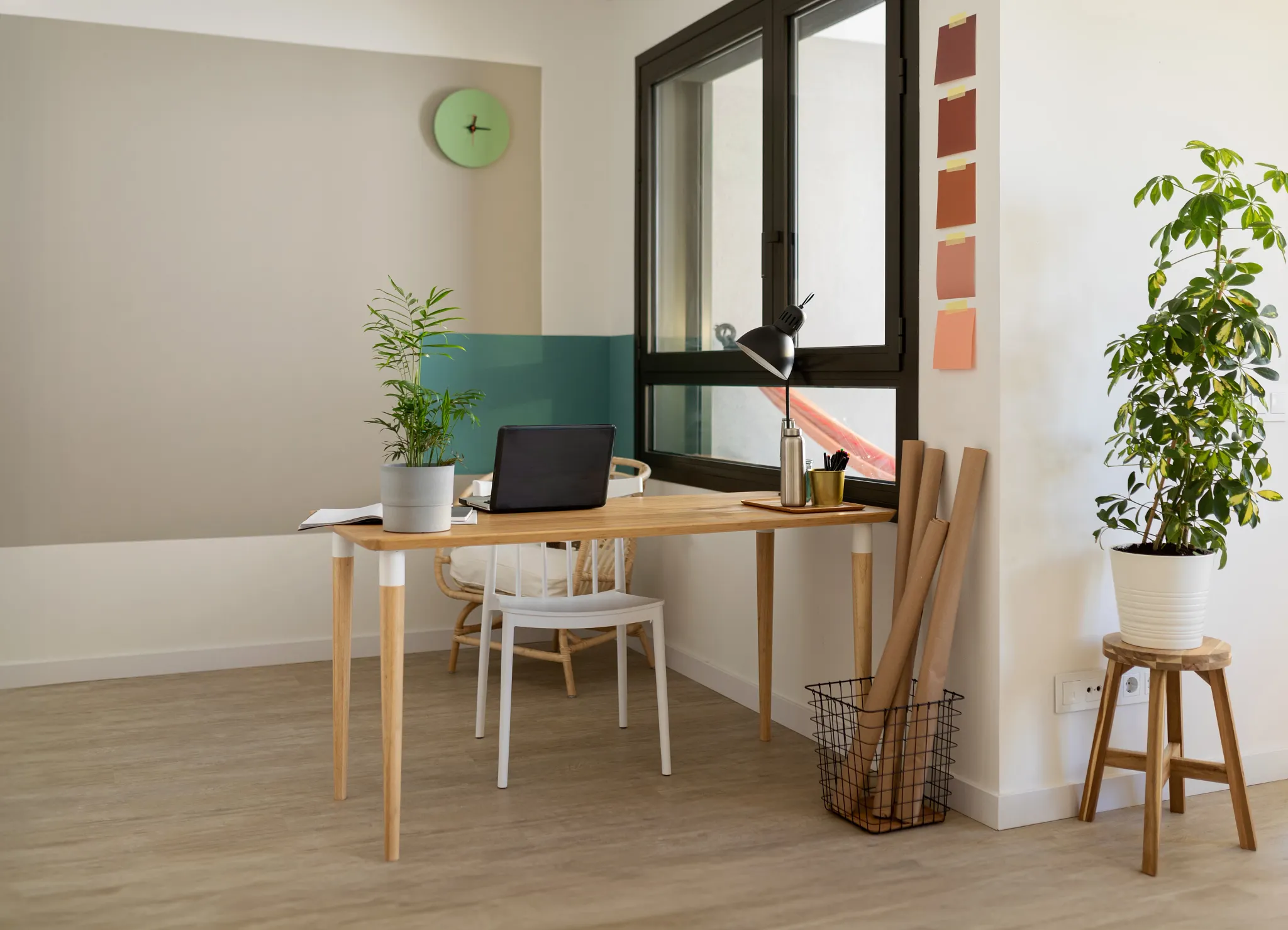 Cozy living room with hardwood flooring, featuring a comfortable sofa and a coffee table