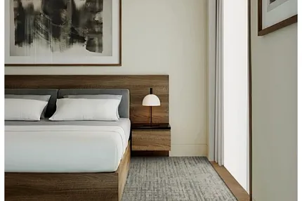 Stylish hospitality carpet for contemporary hotel interiors Modern hotel room with tufted broadloom carpet in neutral tones