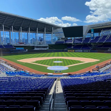 Artificial Turf Baseball Stadium Field Baseball stadium with artificial turf field under a clear blue sky