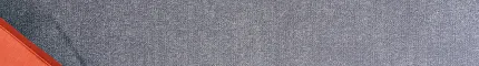 Grey commercial carpet tile in a modern lounge setting with orange sofa Stylish grey carpet tile 24x24 inch for contemporary spaces