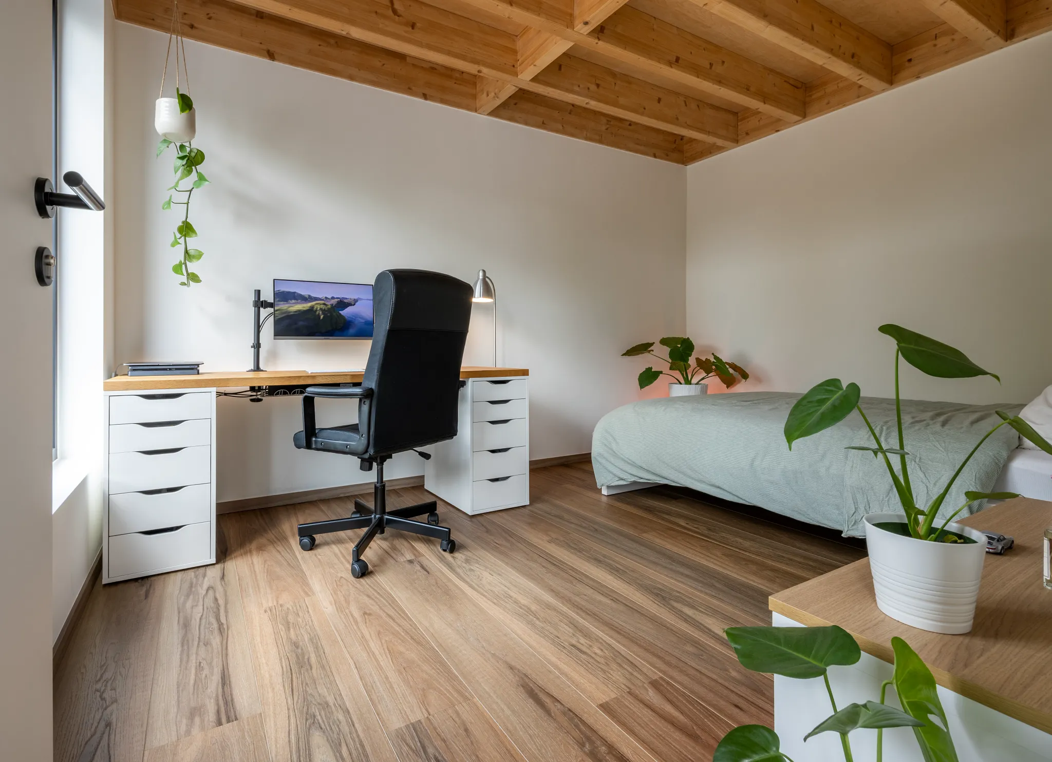 Wood oak look luxury vinyl plank floor shade dark brown in industrial bedroom