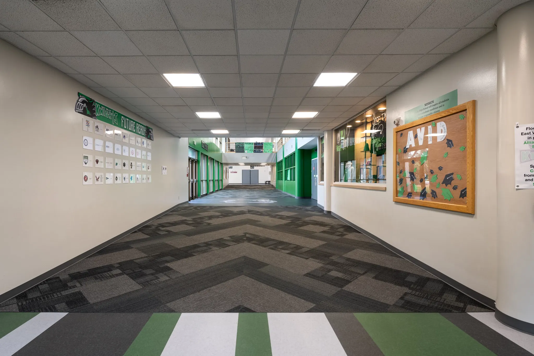 Heavy commercial luxury vinyl tile in an education facility hallway