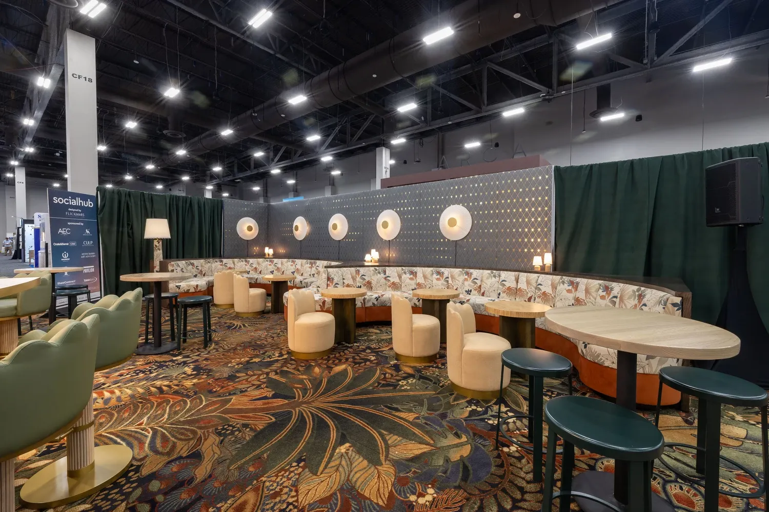 Vibrant floral carpet in a modern hospitality lounge