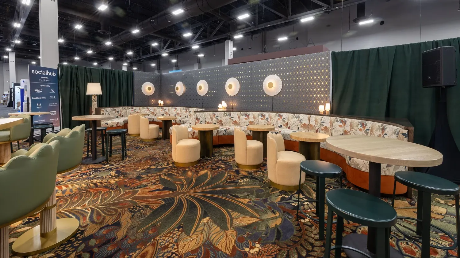 Curved lounge seating at flooring tradeshow booth
