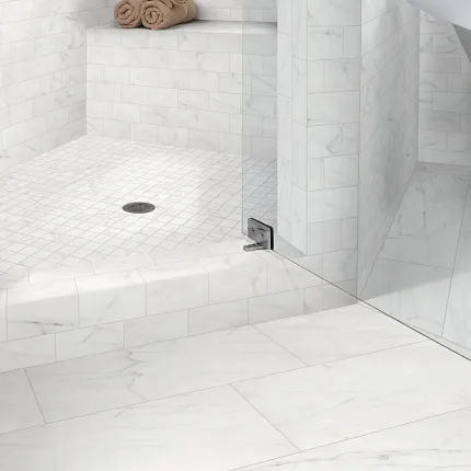 White Marble Tile Shower with Glass Door and Bench for a Luxurious Bathroom Experience Elegant white marble tile shower with glass door and bench