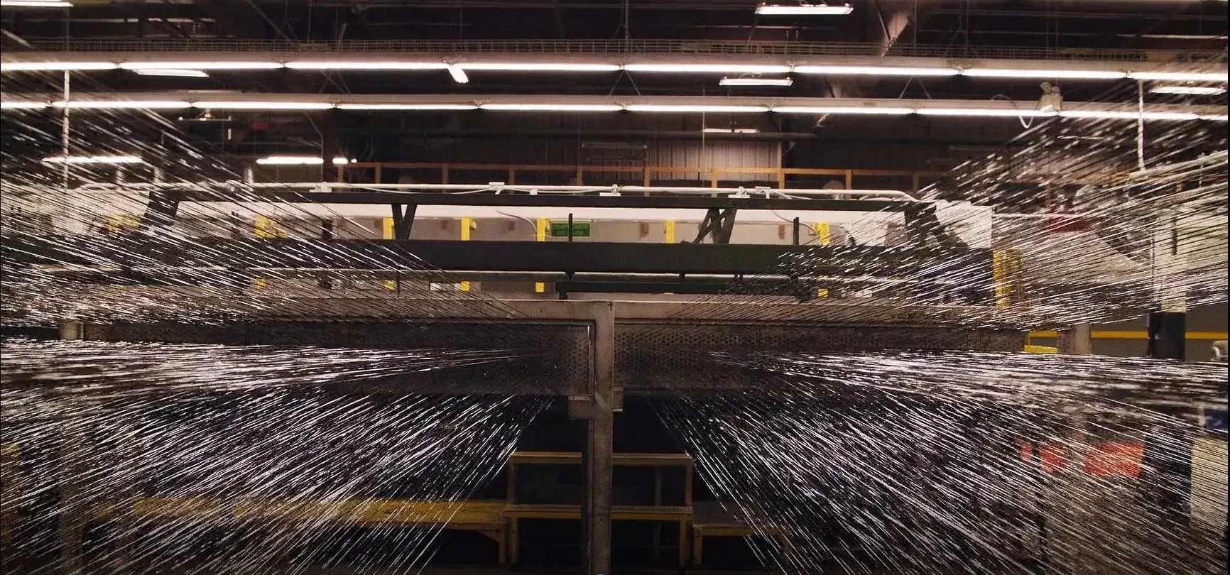 Industrial yarn manufacturing process in factory setting