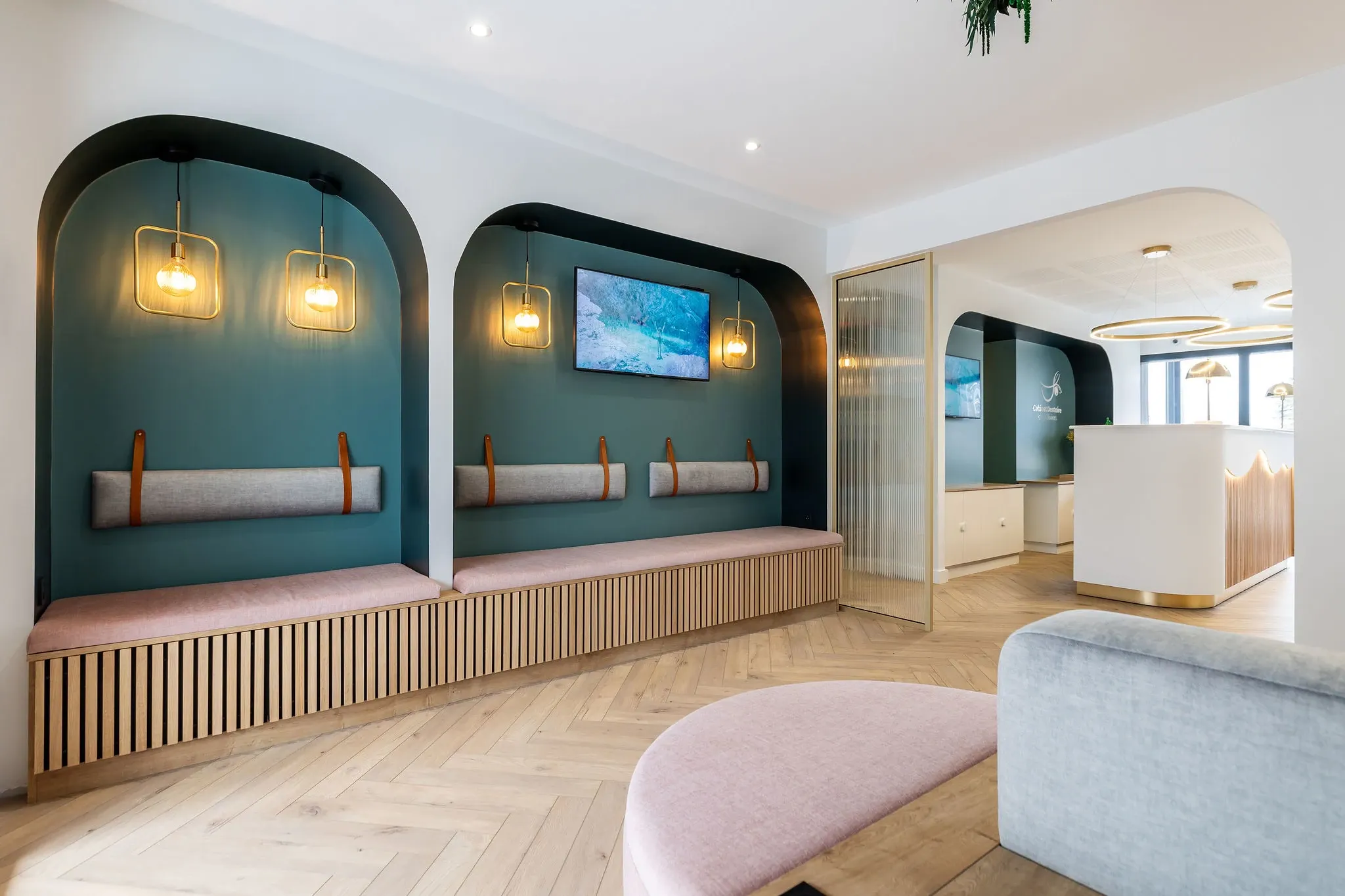 Modern waiting area with herringbone wood flooring