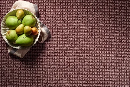 Maroon Textured Broadloom Carpet - 12 ft Width Close-up of a textured broadloom carpet in maroon