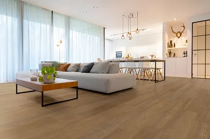 Wood Look Luxury Vinyl Plank Flooring in Modern Living Room Scene living room with wood look luxury vinyl plank floor with a layout with a large sectional sofa and  decor