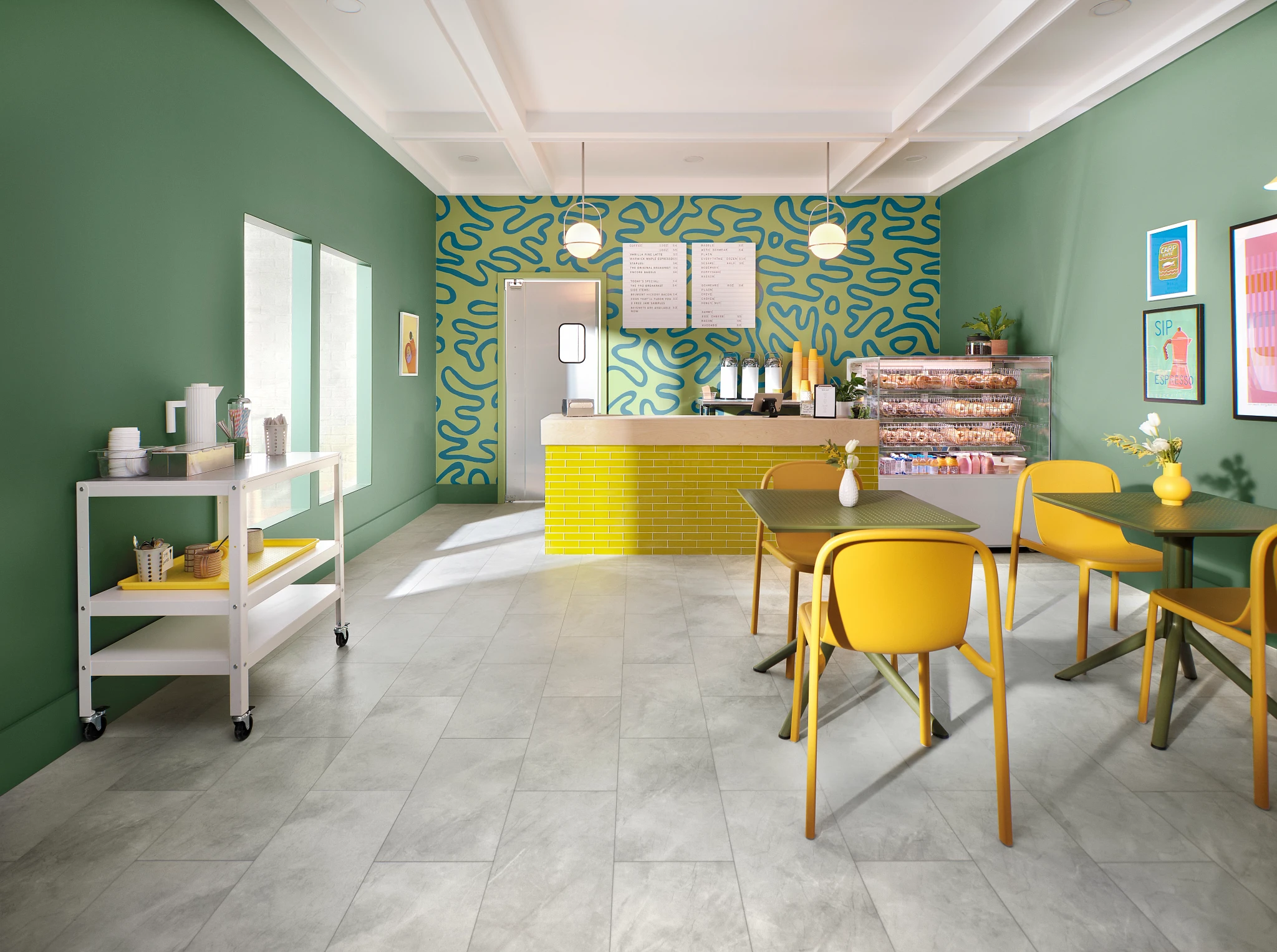 Brightly colored green and yellow cafe featuring COREtec tile look vinyl flooring.