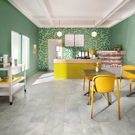 Cheerful colored cafe or bistro scene Brightly colored green and yellow cafe featuring COREtec tile look vinyl flooring.