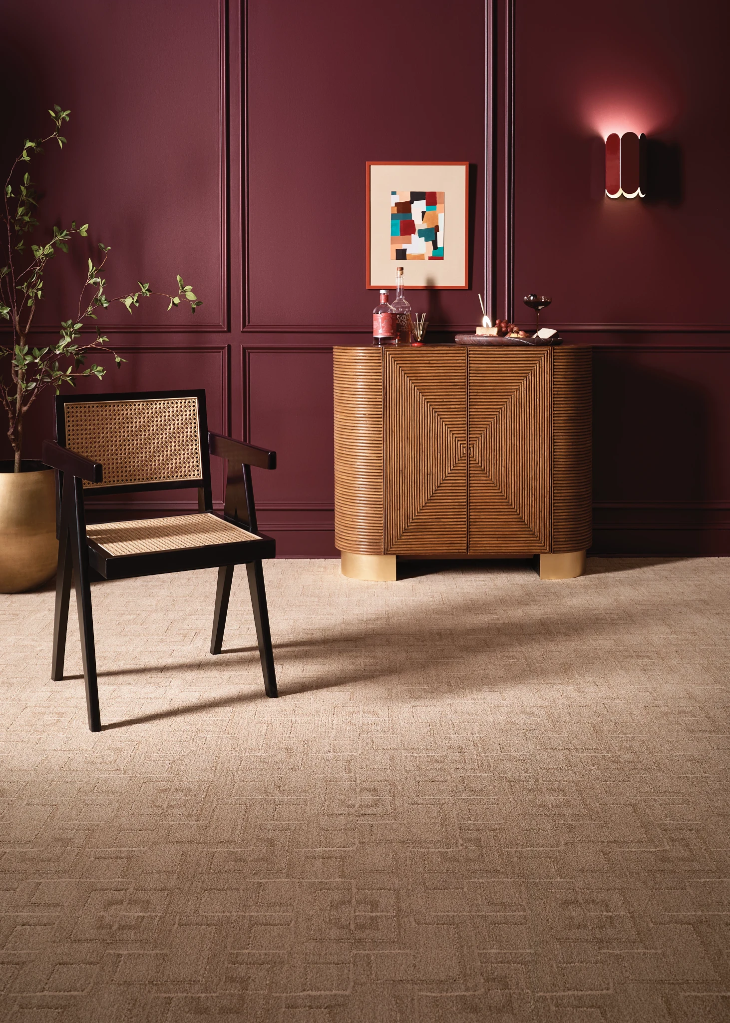 Elegant beige broadloom carpet in a luxurious room with geometric pattern