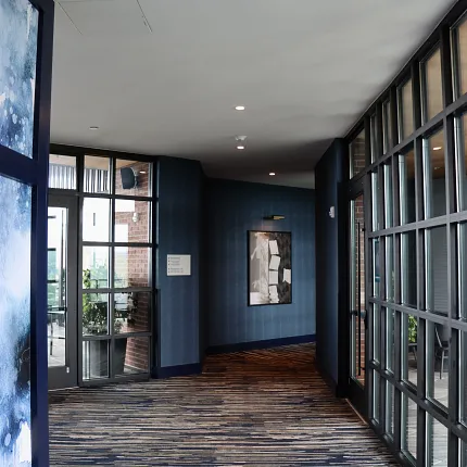Stylish commercial carpet tile for hospitality spaces Modern hallway with commercial carpet tile in blue and beige tones