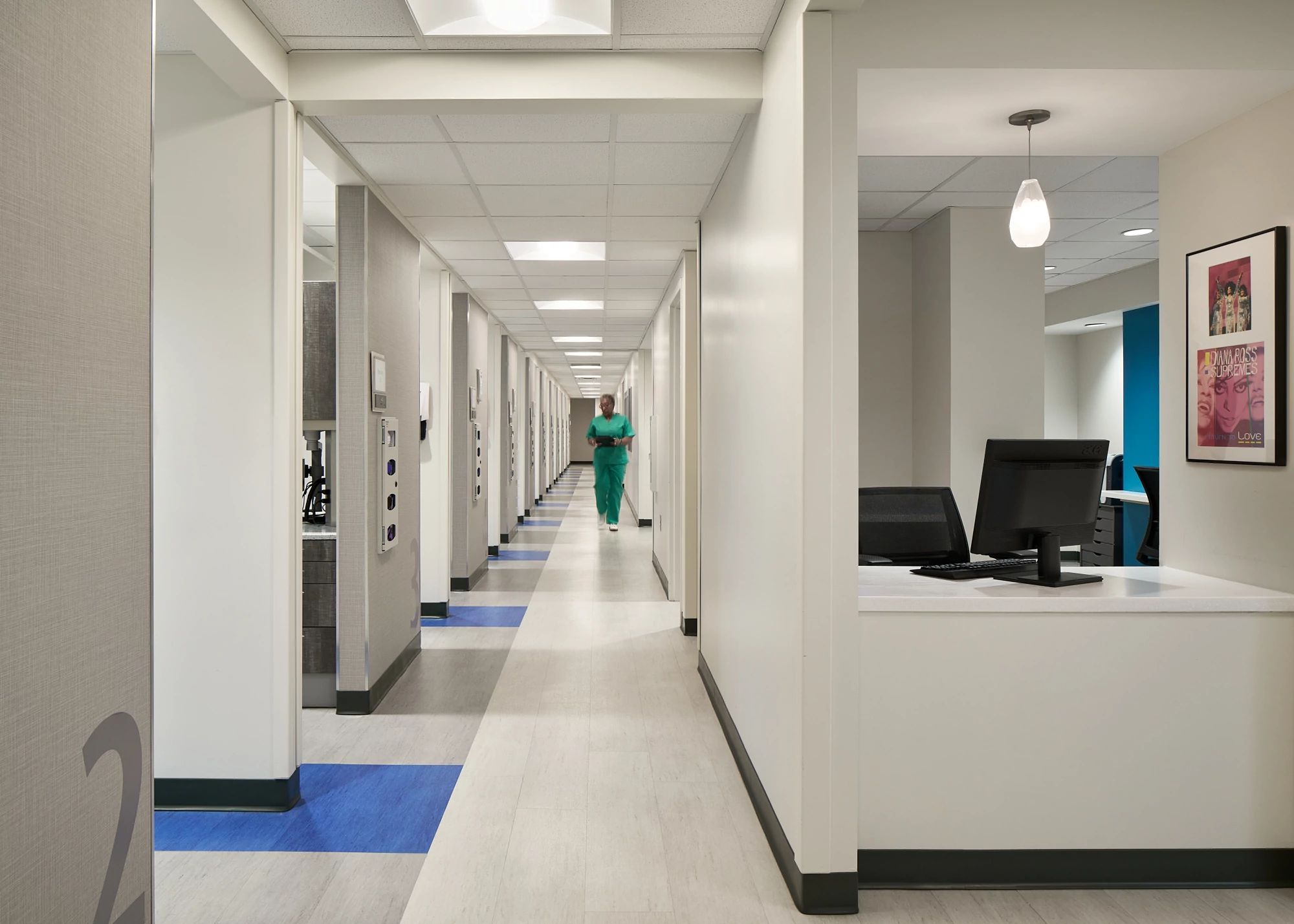 A nurse walking down a hallway the grady health ponce de leon clinic