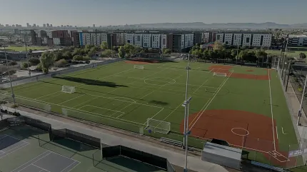 Multi-sport complex with soccer and baseball fields Aerial view of sports fields with soccer and baseball areas