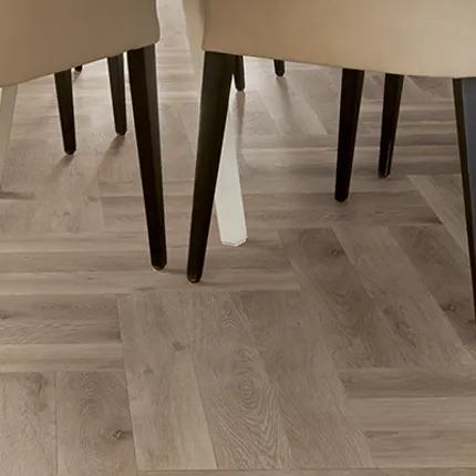 Light Wood Look Luxury Vinyl Plank Flooring in Dining Room Scene Modern dining room with beige chairs on light wood look luxury vinyl plank flooring