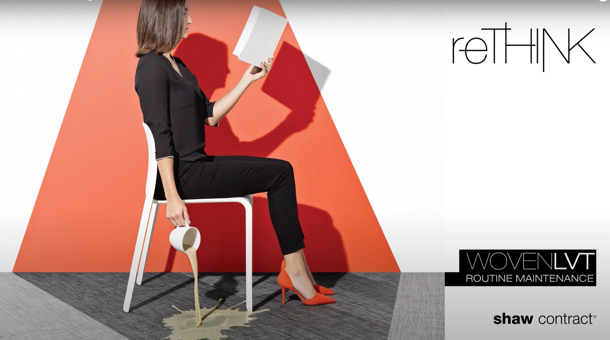 Woman reading book with coffee spill on Shaw Contract woven LVT flooring