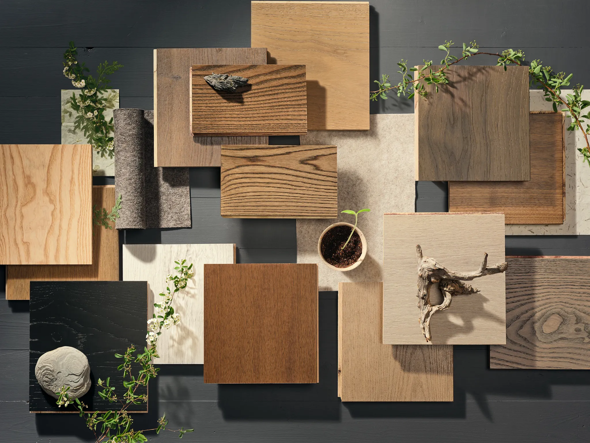 Assorted wood flooring samples with natural elements