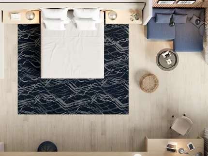 Modern Bedroom with Light Wood Flooring and Dark Blue Rug Finding Focus