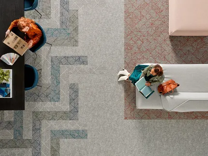 Modern Workplace with Patterned Commercial Carpet Tiles in Grey, Blue, and Red Collaboration in Progress + True Progress + Meaningful Progress + Efficient Progress + Rapid Progress and Huddle in Progress and Kickoff in Progress +