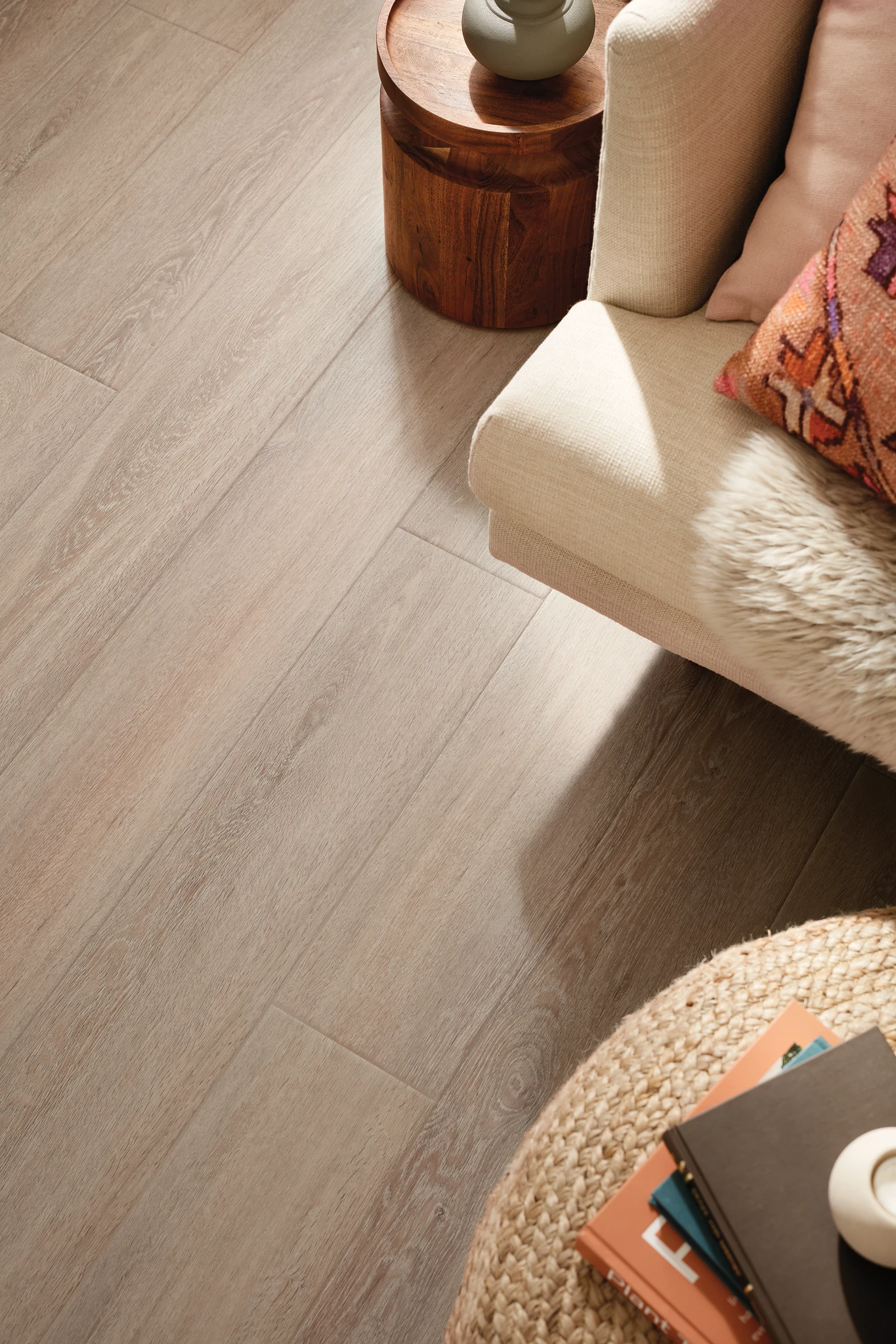 living room with beige luxury vinyl plank floor with