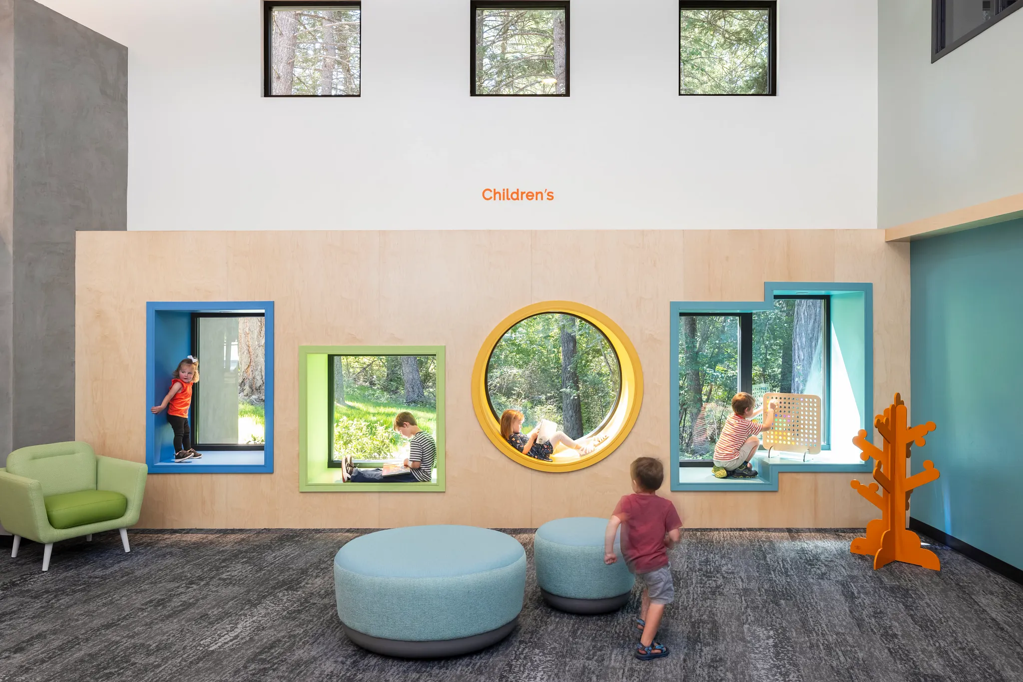 Children's education facility with commercial carpet tile flooring in a playful setting, featuring 9x36 inch carpet tiles