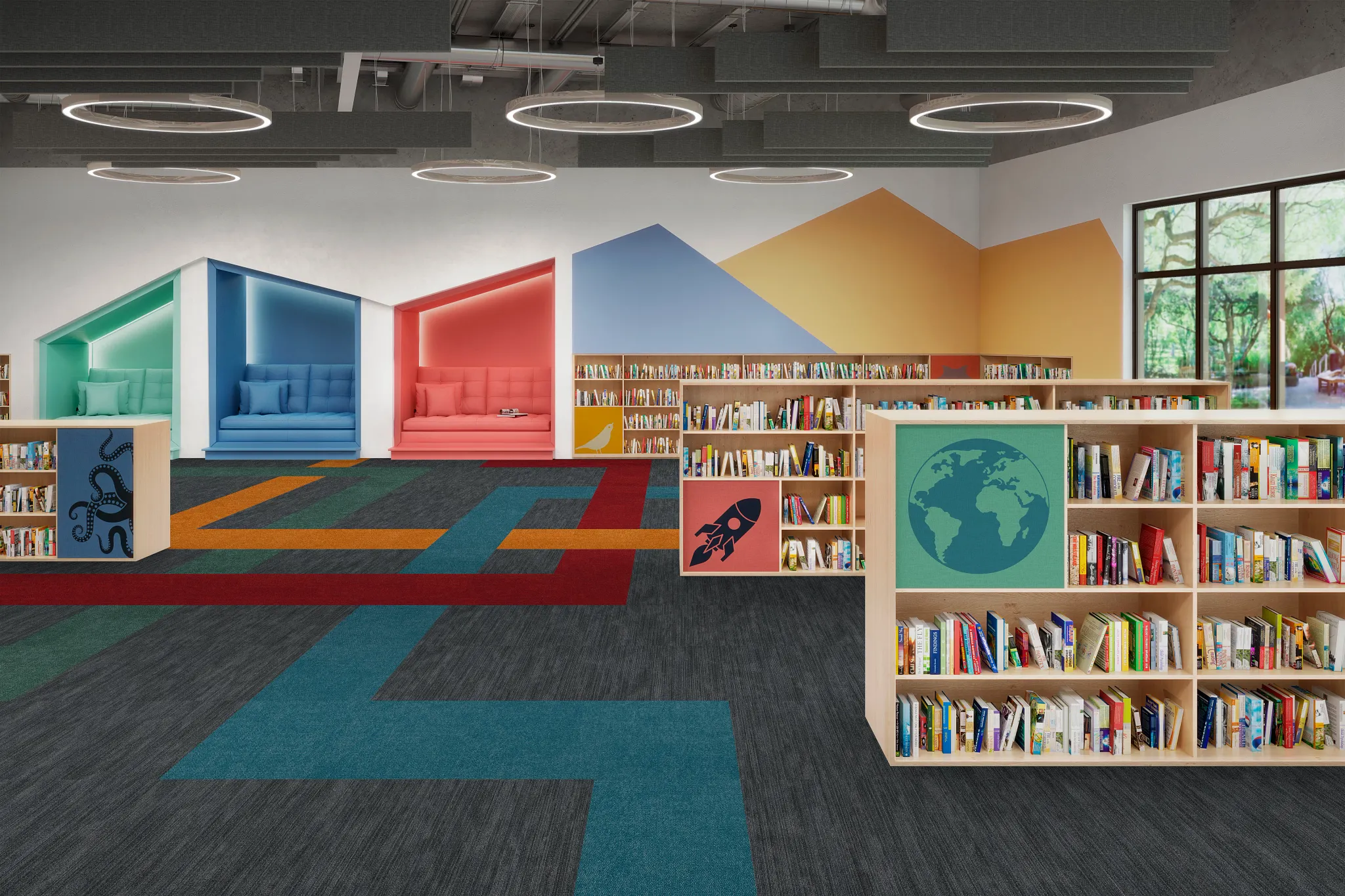 Education facility library with colorful carpet tiles in blue, red, orange, and gray, featuring modern seating and bookshelves