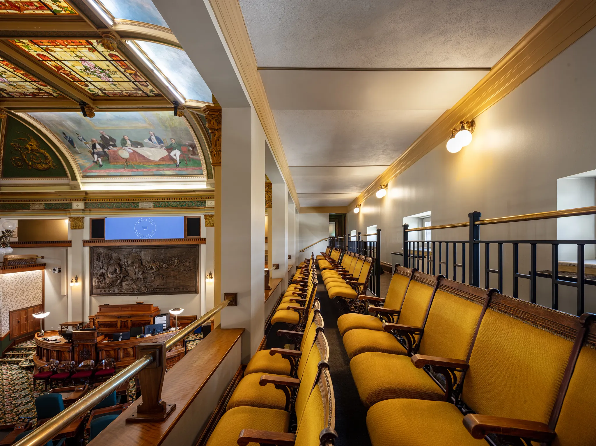 Government facility with yellow seating and broadloom carpet