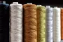 Zeftron solution dyed nylon 6 commercial carpet fiber with fade-resistant color surpassing PET and polypropylene alternatives Solution dyed nylon 6 carpet fiber close-up showing vibrant permanent color technology for commercial interiors