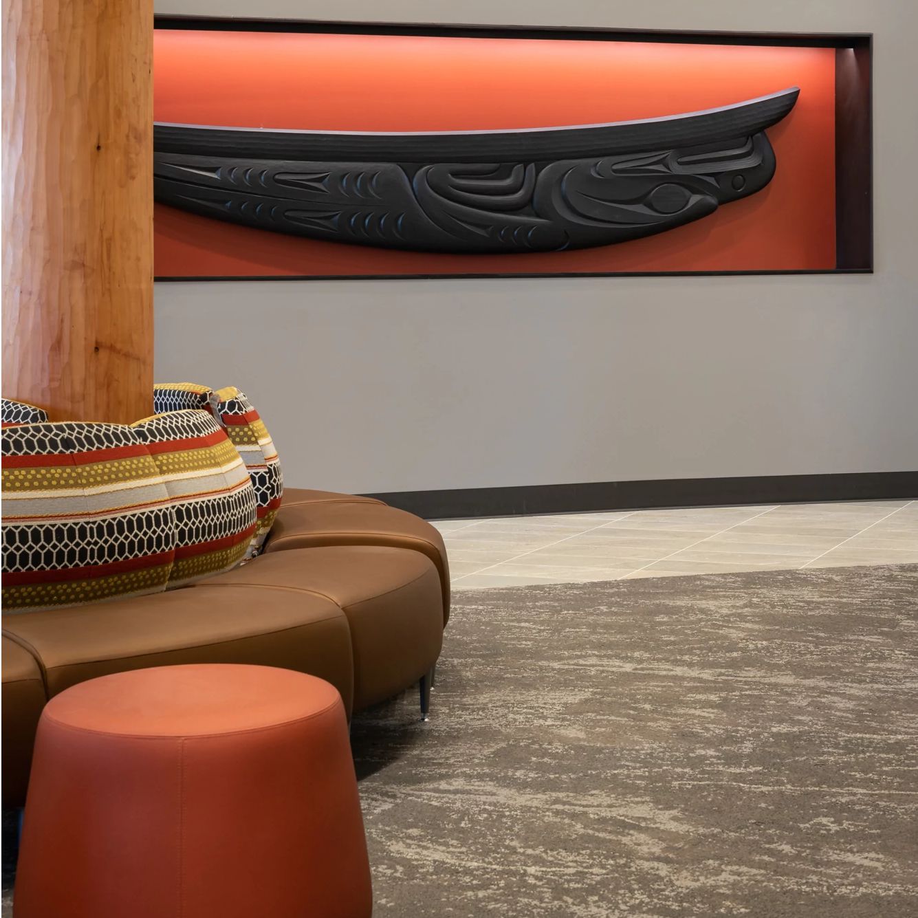 Carved wooden canoe displayed inside a healing clinic.